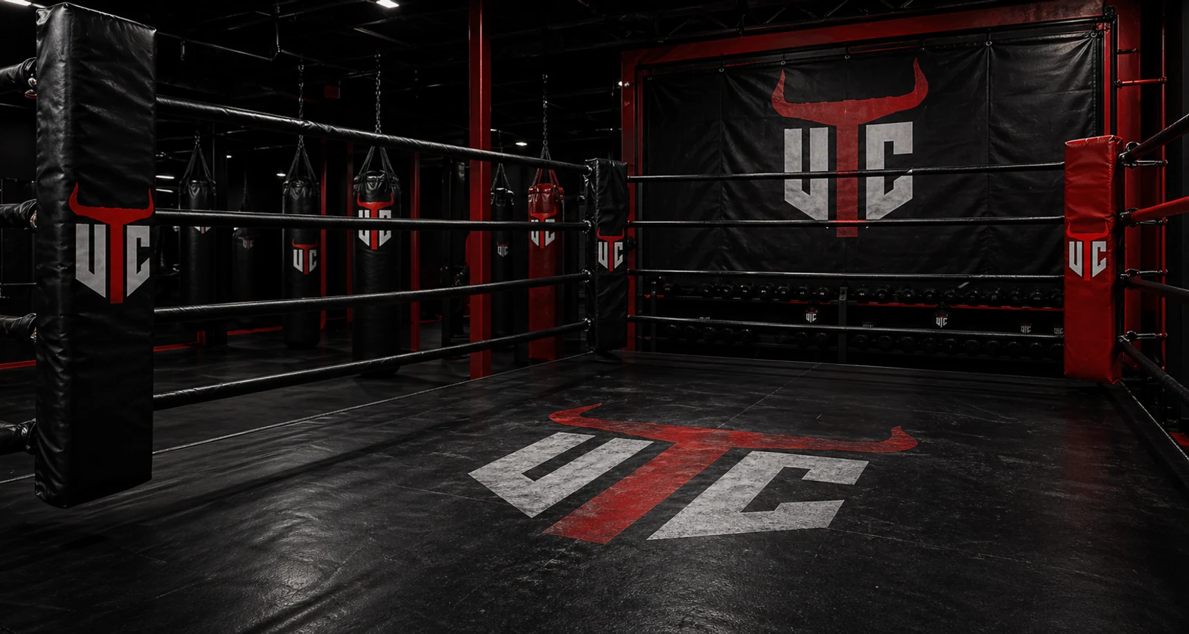 UTC branded boxing ring corner pads inside the Spain training camp